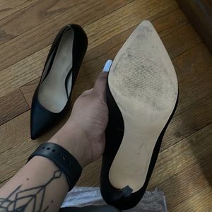 Used black stiletto’s heel